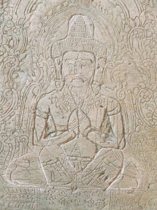 An carving of the Buddha that was modified from a carving of an apsara. Many of the temples at Angkor changed from Buddhist to Hindi temples or vice versa depending on the ruling King.  